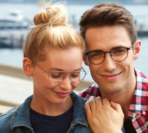 Male and Female model in sunglasses and posing